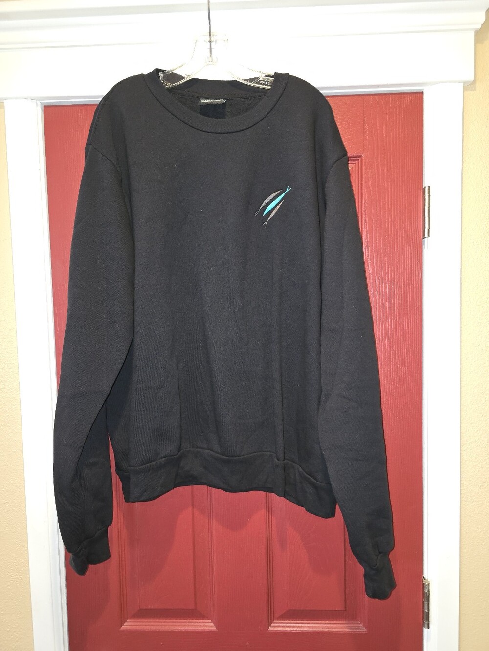 The Chosen Black Crewneck Sweatshirt w/Teal & White embroidered fish detail